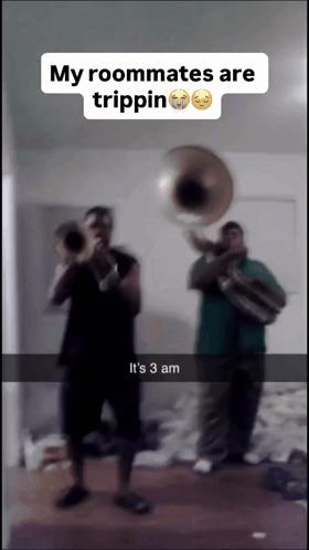 A Snapchat Of Two Men Playing Instruments With The Caption " My Roommates Are Trippin It 'S 3 Am " GIF