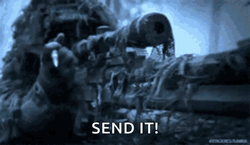 A Sniper Is Holding A Rifle In His Hand And Says Send It . GIF