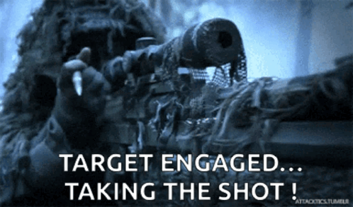A Sniper With The Words Target Engaged Taking The Shot GIF