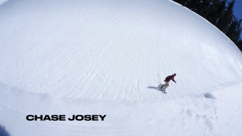 A Snowboarder Is Doing A Trick In The Snow And The Name Chase Josey Is On The Bottom GIF