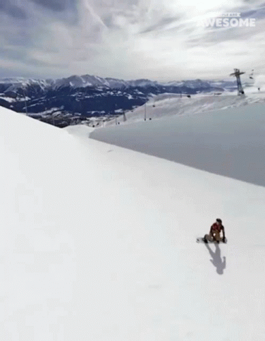 A Snowboarder Is Doing A Trick On A Snowy Slope And The Words Awesome Are Visible GIF