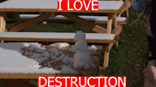 A Snowman Sits On A Picnic Table With The Words I Love Destruction Below It GIF