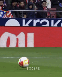 A Soccer Ball Is Being Kicked In Front Of A Sign That Says Krak On It GIF