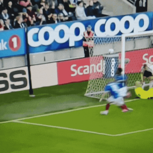 A Soccer Field With A Banner That Says Coop GIF