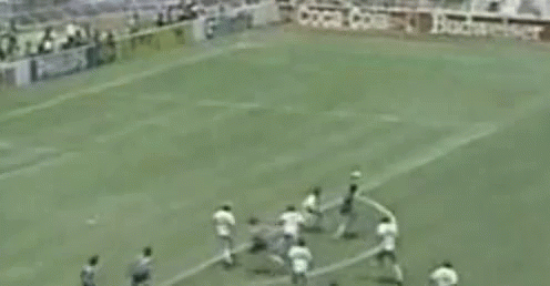 A Soccer Field With A Seiko Banner On The Side Of It GIF