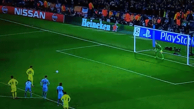 A Soccer Field With Nissan And Heineken Ads On The Side GIF