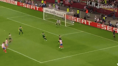 A Soccer Field With Seat Advertisements On The Side GIF