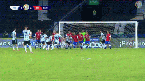 a soccer game between argentina and chile is going on