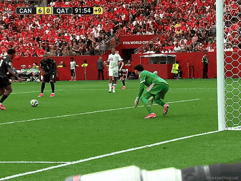 A Soccer Game Between Canada And Qatar Is Being Played GIF