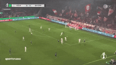 A Soccer Game Between Koln And Bayern Is Being Shown On The Screen GIF