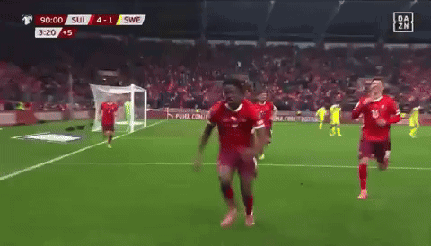 A Soccer Game Is Being Played Between Suisse And Swea GIF