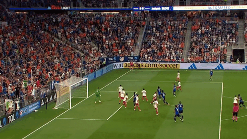 A Soccer Game Is Being Played In A Stadium Sponsored By Adidas GIF
