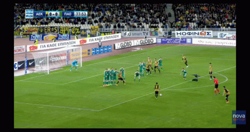 A Soccer Game Is Being Played In A Stadium Sponsored By Globo And Nova GIF