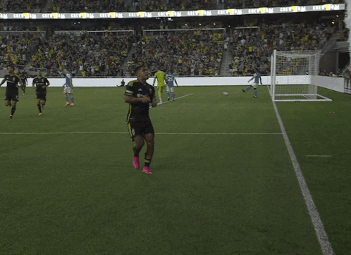 A Soccer Game Is Being Played In A Stadium That Says Crew On The Stands GIF