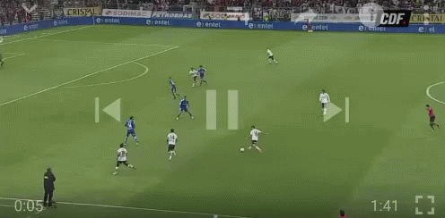 A Soccer Game Is Being Played In A Stadium With A Banner That Says Camiones GIF