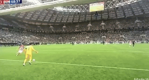 A Soccer Game Is Being Played In A Stadium With A Lot Of People Watching . GIF