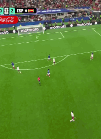 a soccer game is being played in a stadium with a motorola ad