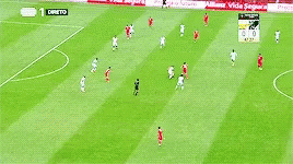 A Soccer Game Is Being Played In A Stadium With A Sign That Says Seguro GIF