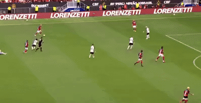 a soccer game is being played in a stadium with advertisements for betano and superbet