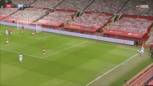 a soccer game is being played in an empty stadium and the score is 0-0
