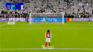 A Soccer Game Is Being Played In Front Of A Banner For Pepsi GIF