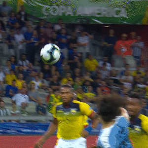 A Soccer Game Is Being Played In Front Of A Banner That Reads Copa America GIF