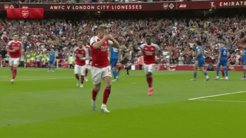 A Soccer Game Is Being Played In Front Of A Banner That Says Awfc V London City Lionesses GIF
