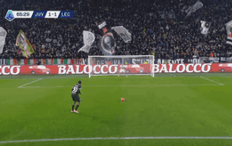 A Soccer Game Is Being Played In Front Of A Banner That Says Juventus GIF