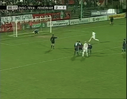A Soccer Game Is Being Played In Front Of A Banner That Says Naplo GIF