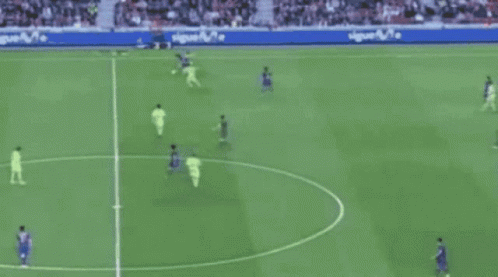 A Soccer Game Is Being Played In Front Of A Banner That Says Nike Football.com GIF