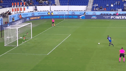 A Soccer Game Is Being Played In Front Of A Banner That Says Power GIF