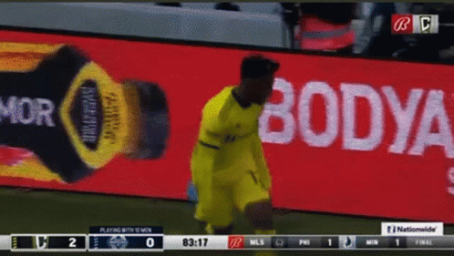 A Soccer Game Is Being Played In Front Of A Bodya Advertisement GIF