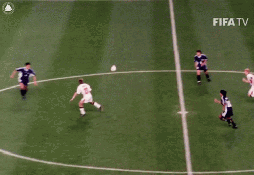 A Soccer Game Is Being Played In Front Of A Canon Advertisement GIF