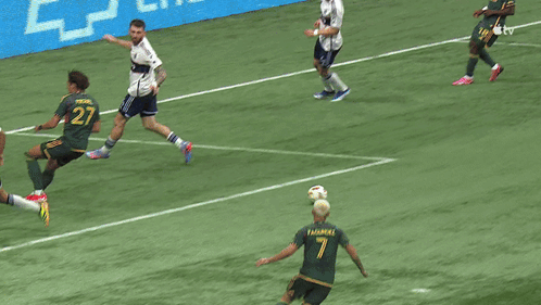 A Soccer Game Is Being Played In Front Of A Chevrolet Sign GIF