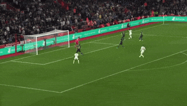 A Soccer Game Is Being Played In Front Of A Crowd With A Banner That Says Allianz On It GIF