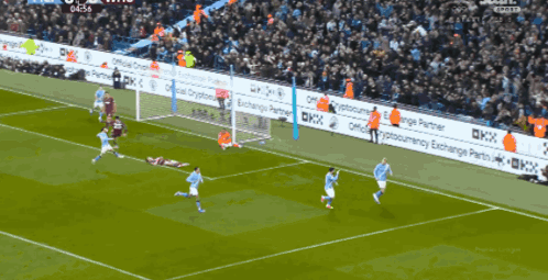 A Soccer Game Is Being Played In Front Of A Crowd With Advertisements For Cryptocurrency Exchange Partners GIF