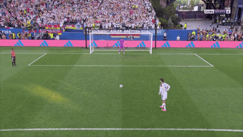 A Soccer Game Is Being Played In Front Of A Large Crowd And The Score Is 0-0 GIF
