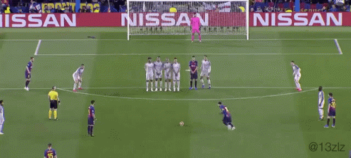 A Soccer Game Is Being Played In Front Of A Nissan Sign GIF