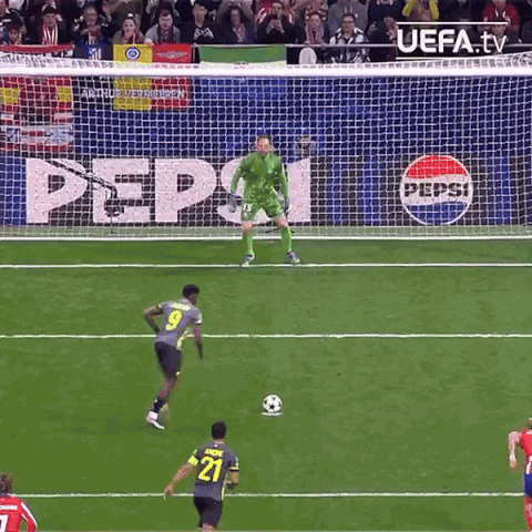 A Soccer Game Is Being Played In Front Of A Pepsi Advertisement GIF