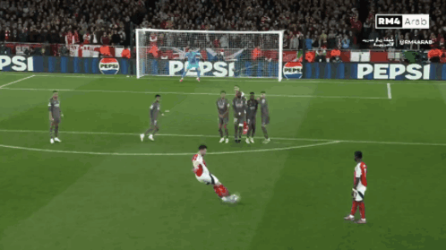 A Soccer Game Is Being Played In Front Of A Pepsi Banner GIF