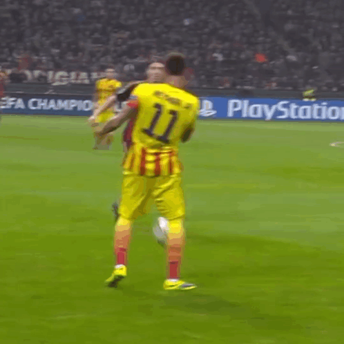A Soccer Game Is Being Played In Front Of A Playstation Banner GIF