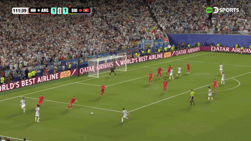 A Soccer Game Is Being Played In Front Of A Qatar Airways Ad GIF