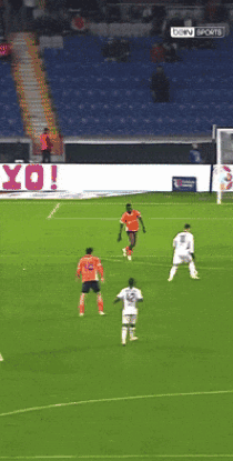 A Soccer Game Is Being Played In Front Of A Sign That Says Bein Sports GIF