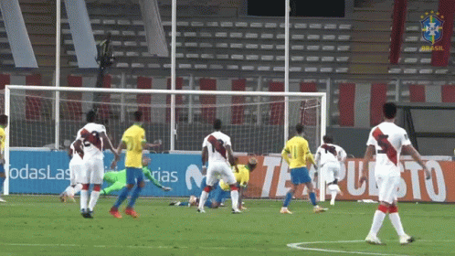 A Soccer Game Is Being Played In Front Of A Sign That Says Todaslas GIF