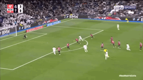 A Soccer Game Is Being Played In Front Of An Emirates Fly Better Banner GIF