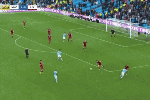 A Soccer Game Is Being Played On A Field That Has A Banner For Nexen Tire GIF