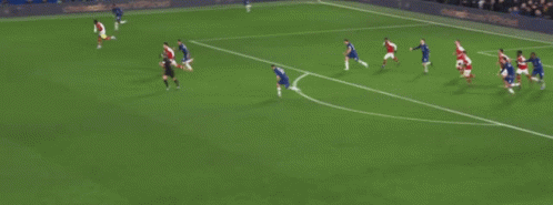 a soccer game is being played on a field with a sign that says every game