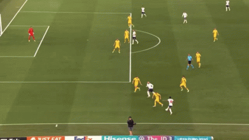 A Soccer Game Is Being Played On A Field With A Sign That Says ' United Airlines ' On It GIF