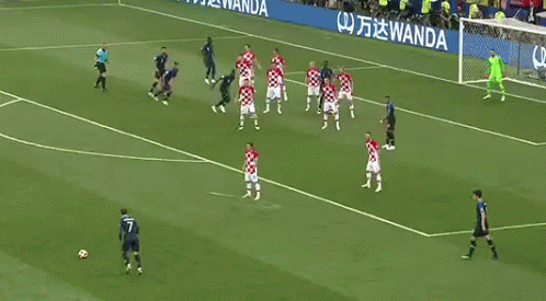 A Soccer Game Is Being Played On A Field With A Wanda Banner GIF