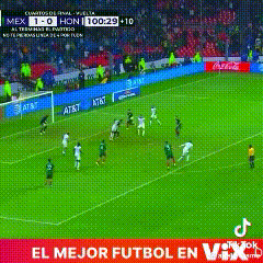 a soccer game is being played on a field with advertisements for at & t and coca cola